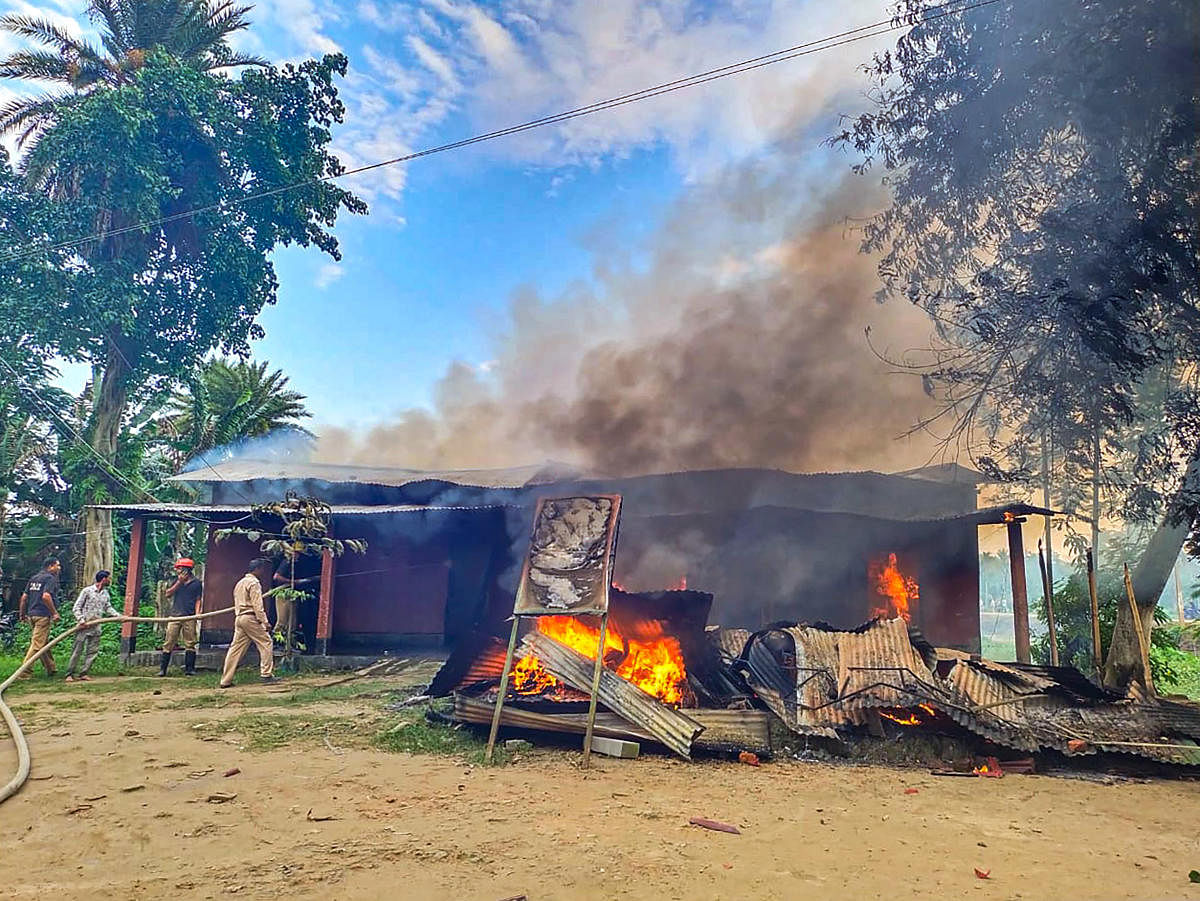 The Batadrava police station after some miscreants set it on fire following the alleged death of a person in police custody, in Nagaon district in Assam. Credit: PTI Photo