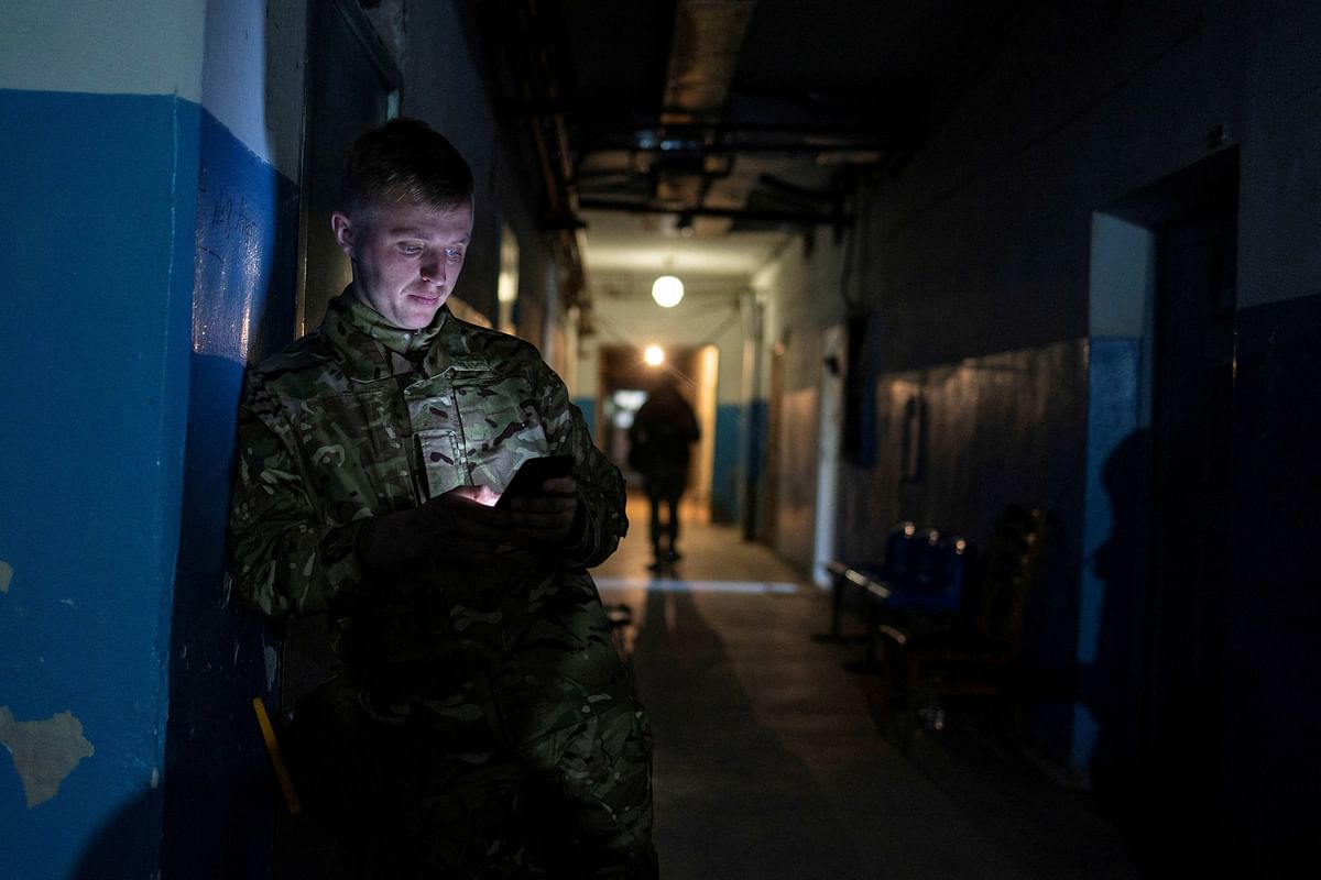 A paramedic waits inside a shelter as a shelling can be heard in the near proximity of a hospital, amid Russia's invasion in Bakhmut, in the Donetsk region, Ukraine. Credit: Reuters Photo