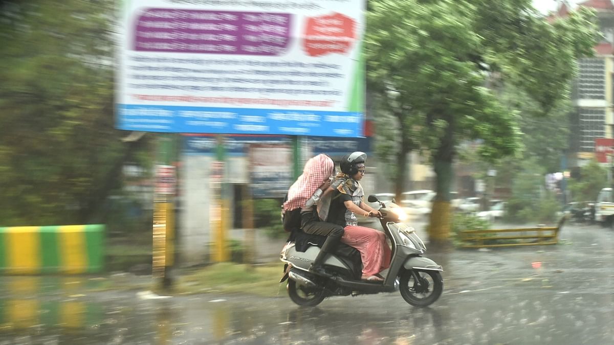 Heavy rain brings mercury levels down in Delhi-NCR; Traffic, power supply disrupted