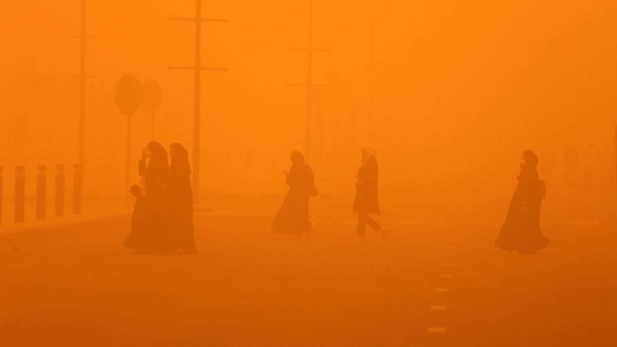 In Pics| Sandstorm shrouds Middle East in orange haze, disrupts normal life