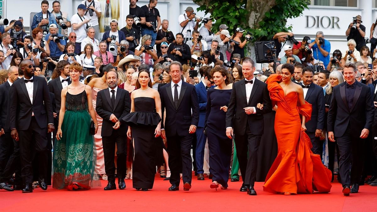 Jury members of the 75th Cannes Film Festival pose together for a photo-op. Credit: Reuters Photo