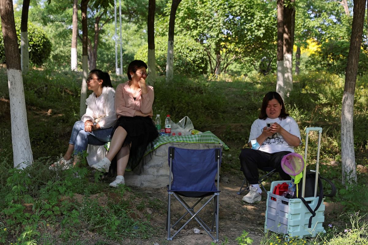 People rest and have picnics at a park, amid the coronavirus disease (COVID-19) outbreak, in Beijing. Credit: Reuters Photo