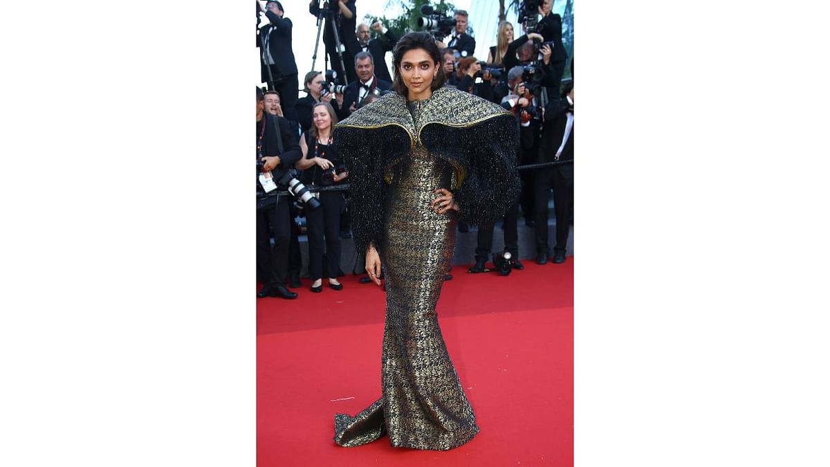 Deepika, who became the first Indian brand ambassador for the internationally recognised label, was seen in a black and golden metallic floor-length gown. Credit: AP Photo