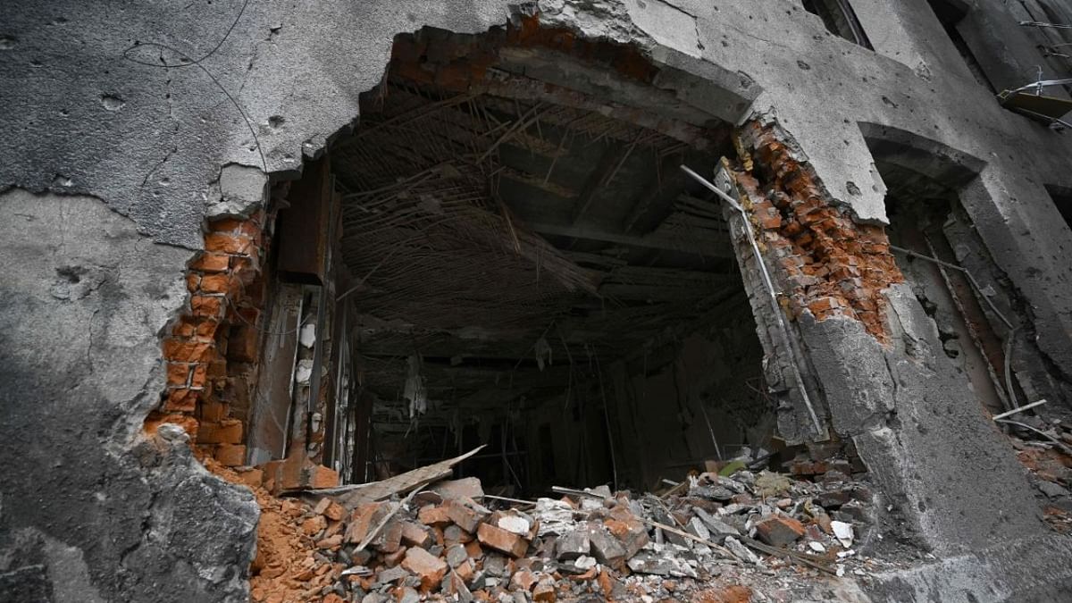 This photograph taken on May 28, 2022, shows the damaged building of the Faculty of Economics of Karazin National University in Kharkiv, amid Russian invasion of Ukraine. Credit: AFP Photo