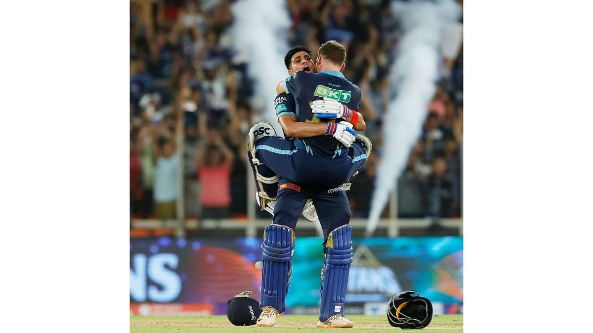 Gill's 45 came from 43 balls and ended with a six that secured the victory. The two batsmen hugged and, as the fireworks erupted, the Gujarat players came running on to the pitch to celebrate. Credit: IPLT20