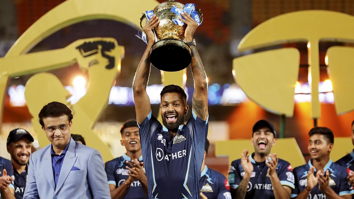 Gujarat Titans captain Hardik Pandya lifts the IPL trophy after winning the final T20 cricket match of the Indian Premier League 2022 between the Gujarat Titans and the Rajasthan Royals, at the Narendra Modi Stadium, Ahmedabad. Credit: PTI Photo