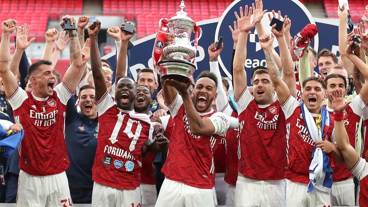 Fourth on the list is Arsenal with three Premier League titles. Credit: AP Photo