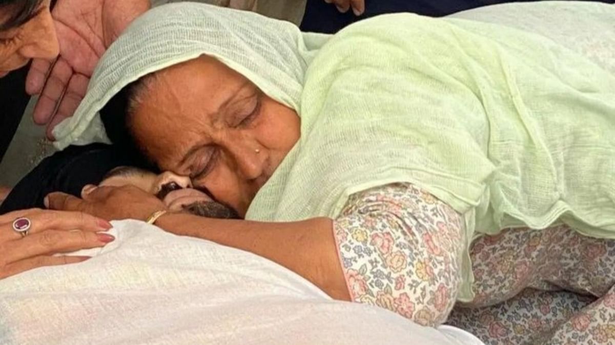 His mother gives Sidhu one last hug before the start of his funeral procession. Credit: Special Arrangement