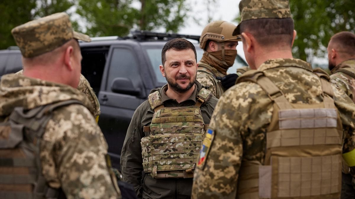 Ukraine's President Volodymyr Zelenskyy interacts with the soldiers during his visit to Kharkiv. Credit: Reuters Photo