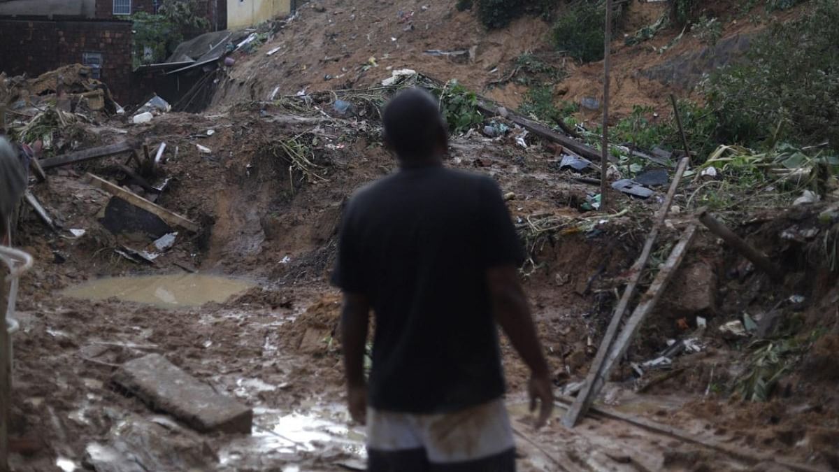 A man looks at the site of a landslide in the community Jardim Montes Verdes, Ibura neighbourhood, in Recife, Pernambuco State, Brazil. Credit: AFP Photo