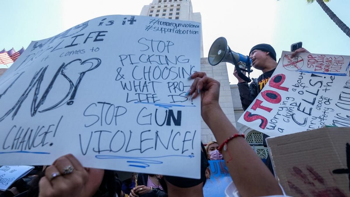 Students participate in a school walk-out and protest in front of City Hall to condemn gun violence, in Los Angeles, California. Credit: AFP Photo