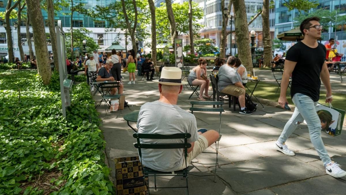 People spend an afternoon in Bryant Park in Manhattan on May 31, 2022 in New York City. Credit: Reuters photo