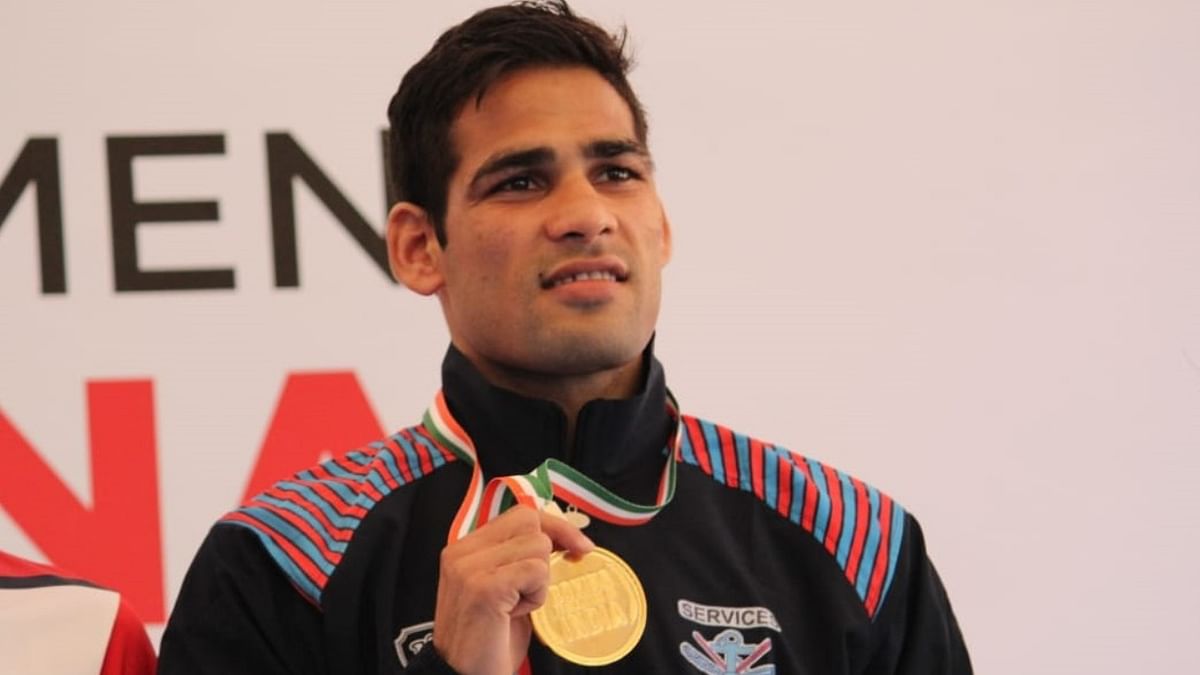 2018 bronze medallist Mohammad Hussamuddin outpowered over 2019 Asian Championship silver medallist Kavinder Singh Bisht 4-1 and grabbed a place in the 57kg category. Credit: DH Pool Photo