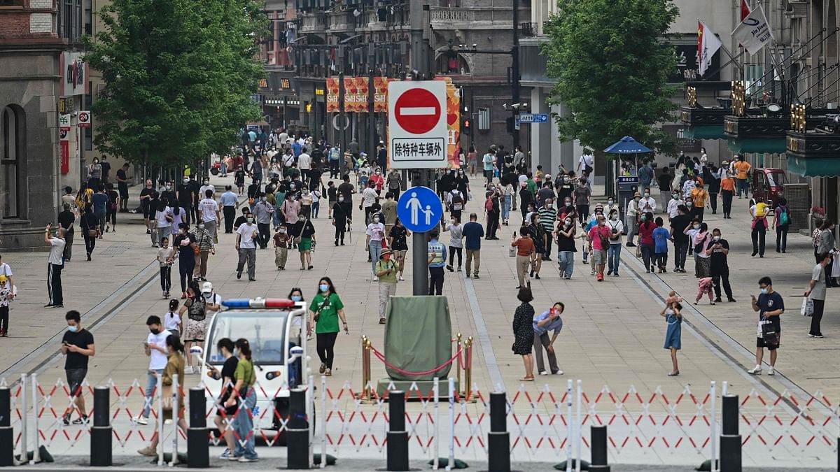 Shanghai authorities eased lockdown restrictions in a step to return the Covid-hit city to normalcy, after eight weeks of heavy-handed restrictions that dampened the businesses and made everyone locked down in their places. Credit: AFP Photo