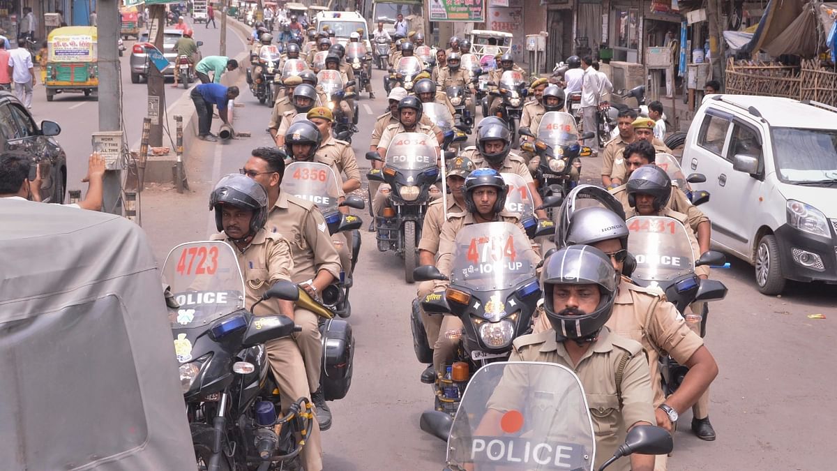Security was beefed up in the Beconganj, Kanpur following a communal clash that broke out between two groups belonging to different communities allegedly over a market shutdown. Credit: PTI Photo