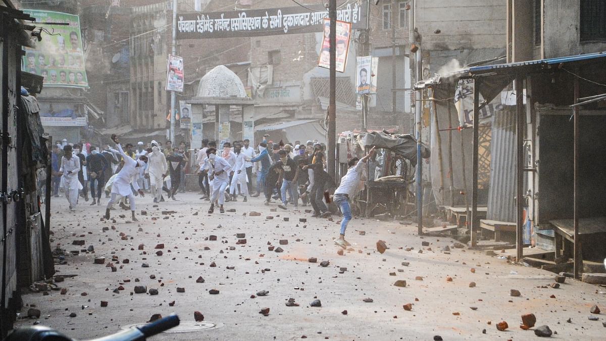After Friday prayers, members of one community started getting the shops closed and the other community protested over this. This led to clashes, followed by stone pelting and brick batting. Sources said that the miscreants had also fired in the air. Credit: PTI Photo
