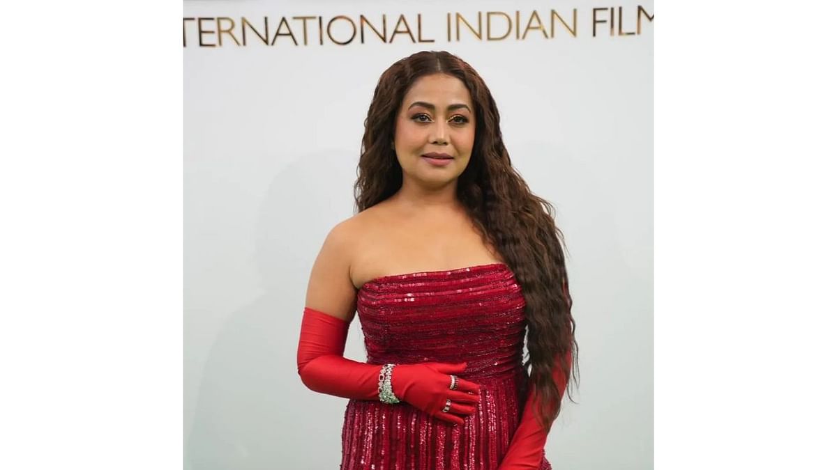 Singer Neha Kakkar raised the style quotient in a red gown. Credit: IIFA
