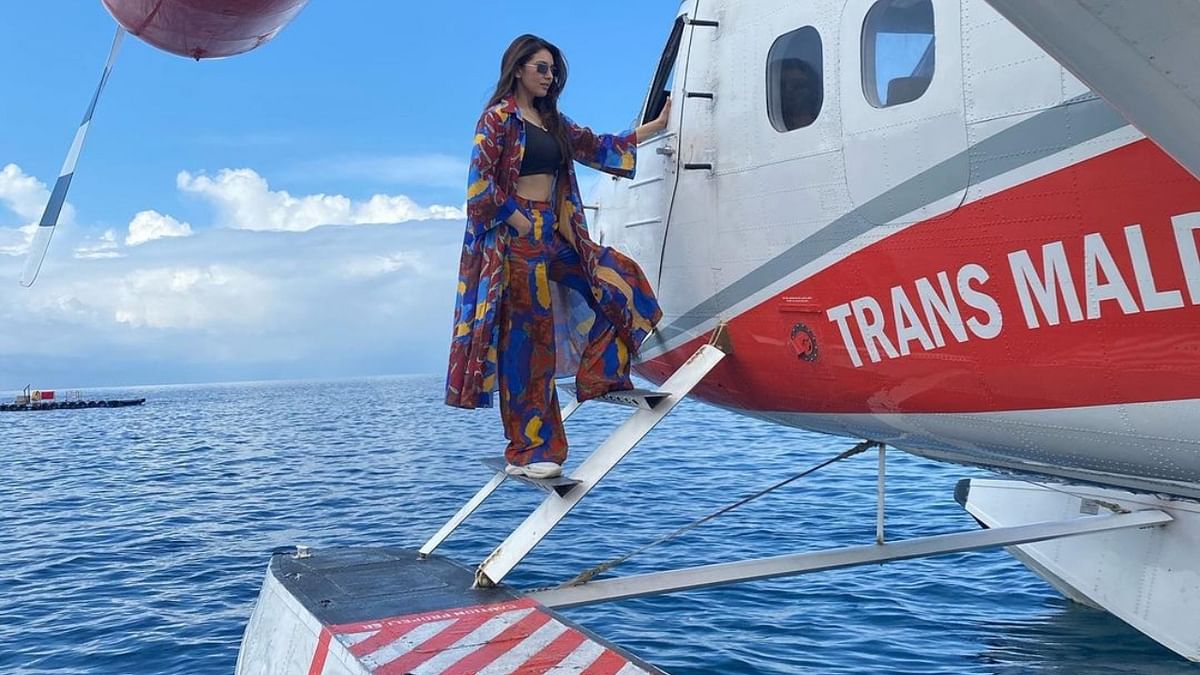 Actress Hansika Motwani shared this picture herself posing in front of a chartered airplane. Credit: Instagram/ihansika