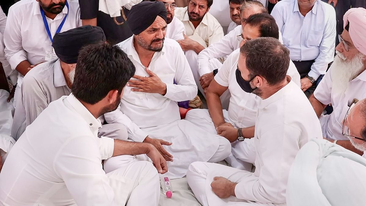 Rahul Gandhi visited Punjab's Mansa district and met the parents of singer Sidhu Moosewala, who was gunned down by assailants on May 29, and expressed his condolences. Credit: PTI Photo