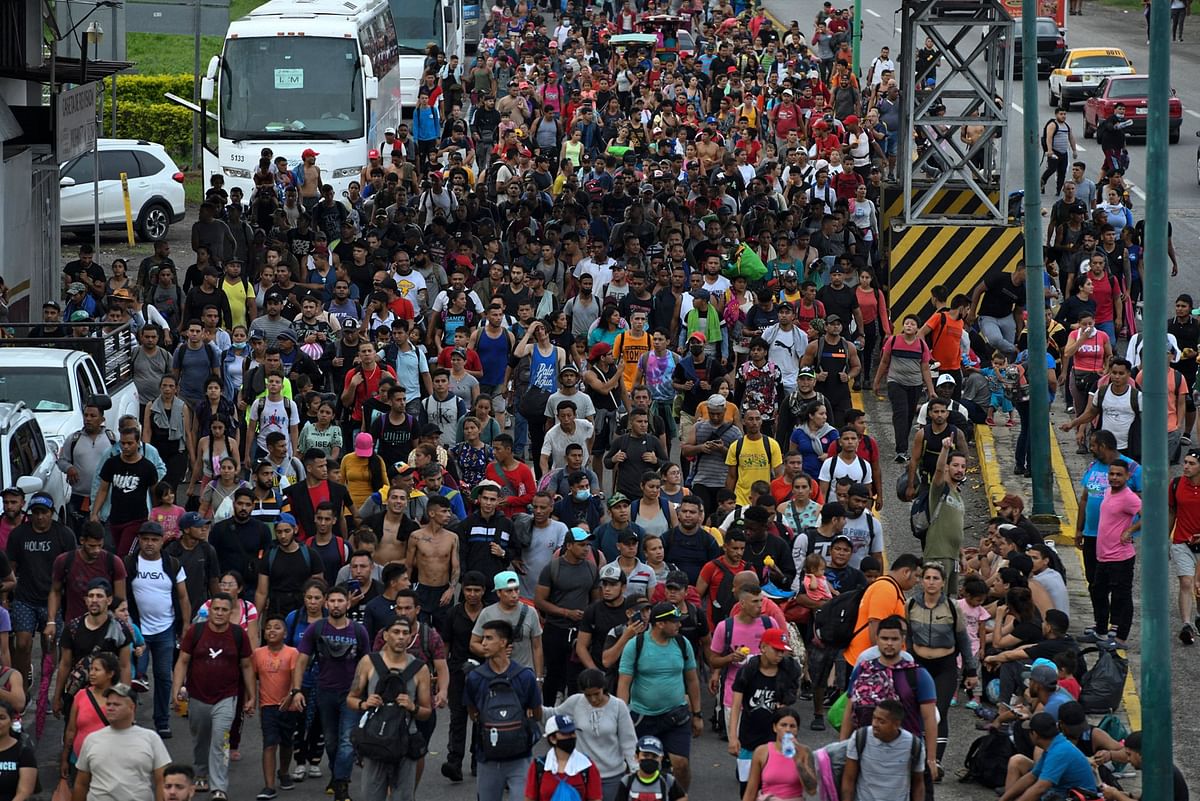 Latin American migrants take part in a caravan towards the border with the United States, in Huehuetan, Chiapas state, Mexico. Credit: AFP Photo