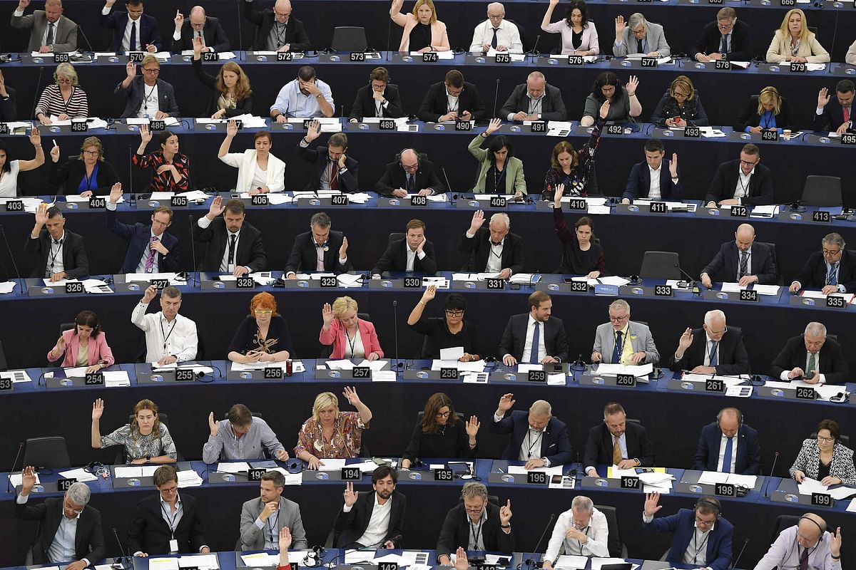 Members of the European Parliament take part in a voting session during a plenary session at the European Parliament in Strasbourg, eastern France. Credit: AFP Photo