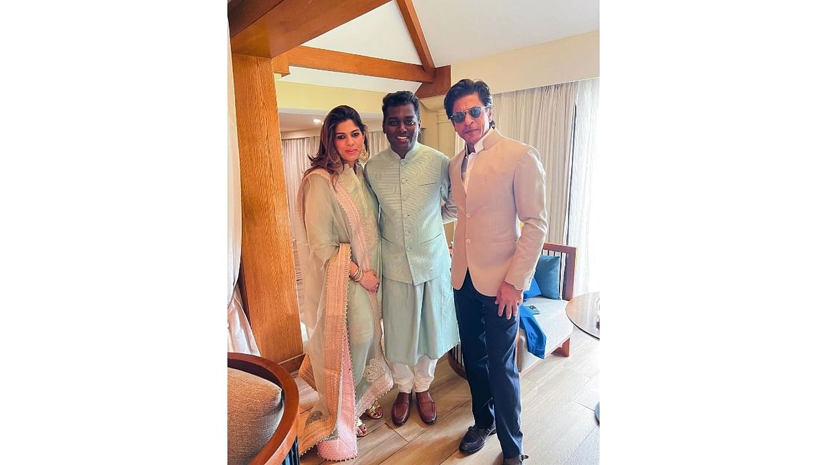 'Jawan' director Atlee flanked by Shah Rukh Khan and Pooja Dadlani at Nayanthara's wedding. Credit: Instagram/atlee47