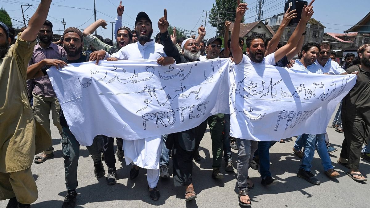 Kashmiri traders are seen carrying out a protest in Srinagar demanding the arrest of Nupur Sharma. Credit: AFP Photo