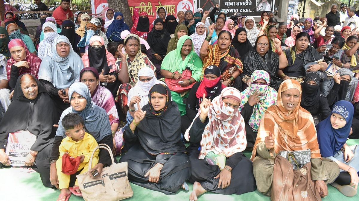 Not just men, but women in large numbers were also seen staging the protest against suspended BJP spokesperson Nupur Sharma over her controversial remarks on Prophet Muhammad. Credit: PTI Photo