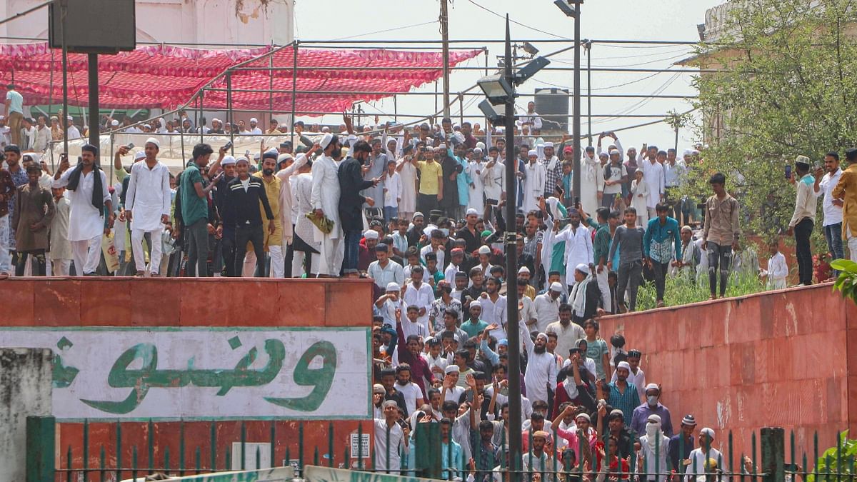 Muslims in large numbers are seen raising slogans against Nupur Sharma after Friday prayers at Tile Wali Masjid, in Lucknow. Credit: PTI Photo