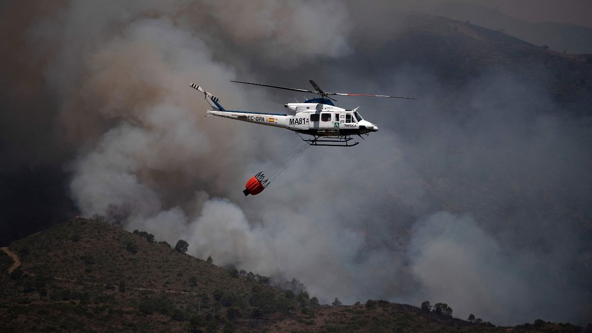 Thousands of people have been evacuated amid fears of a torrid weather that may feed the wildfires in southern Spain. Credit: AFP Photo