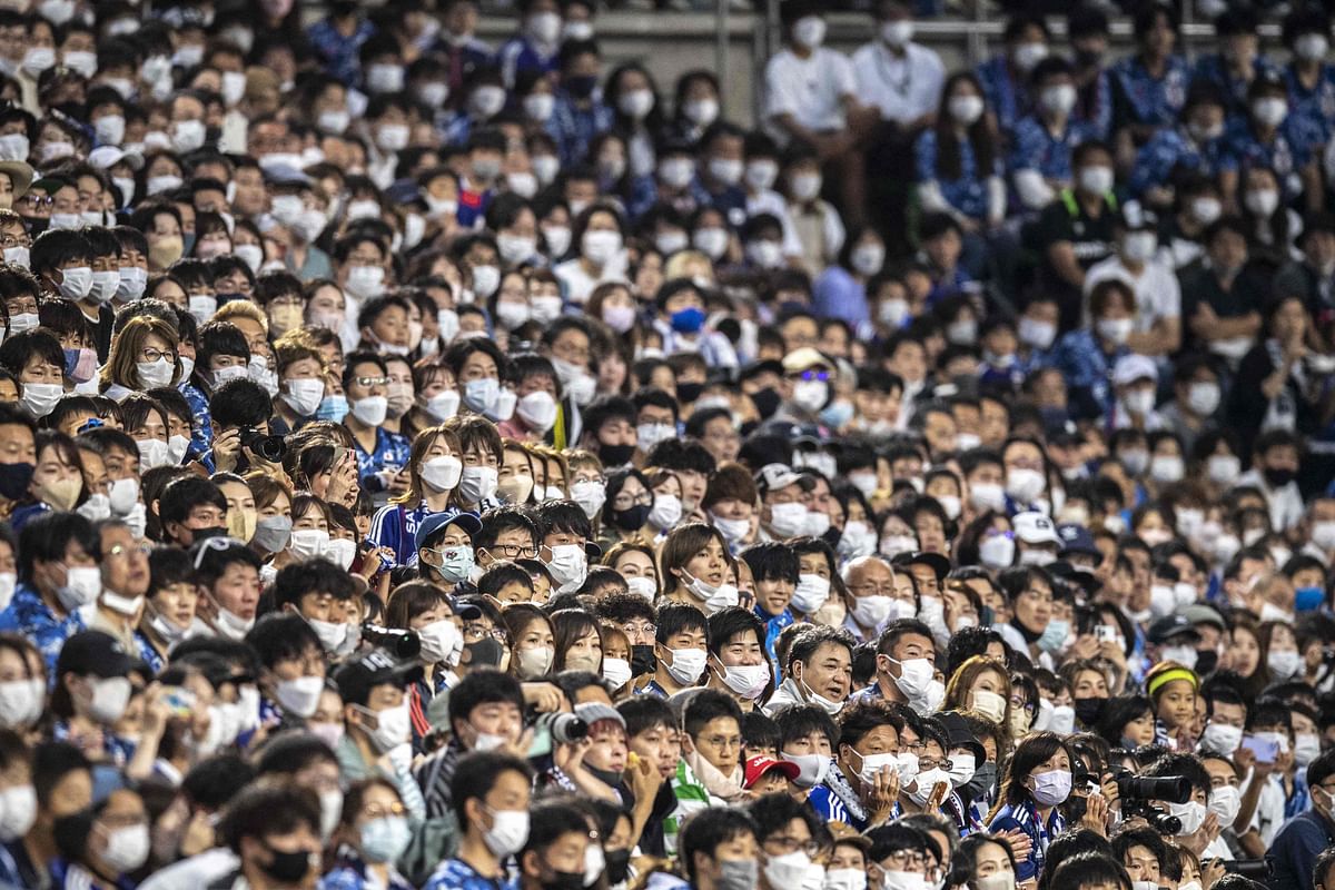 Spectators attend the Kirin Cup football match between Japan and Ghana at Noevir Stadium in Kobe. Credit: AFP Photo