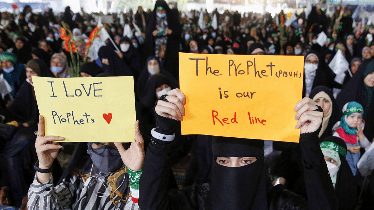 Iranians attend a gathering at the Tehran University to protest remarks about Prophet Mohammed made by Sharma. Credit: AFP Photo