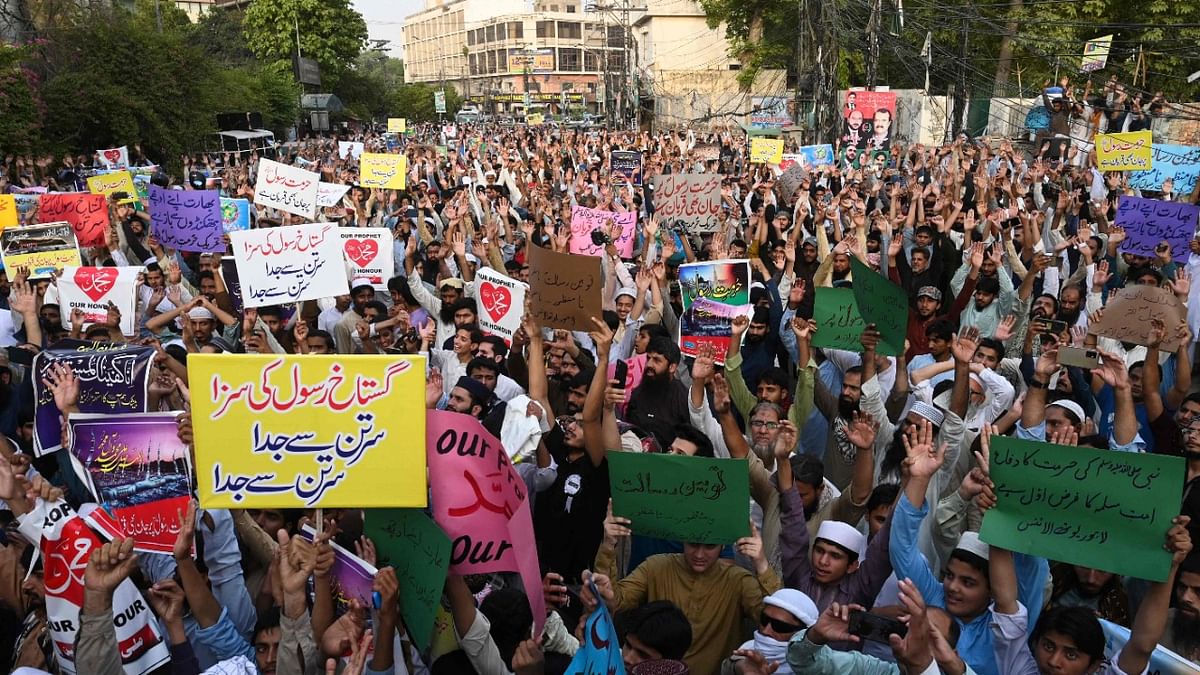 Protestors shout anti-India slogans during a demonstration against Sharma in Lahore. Credit: AFP Photo