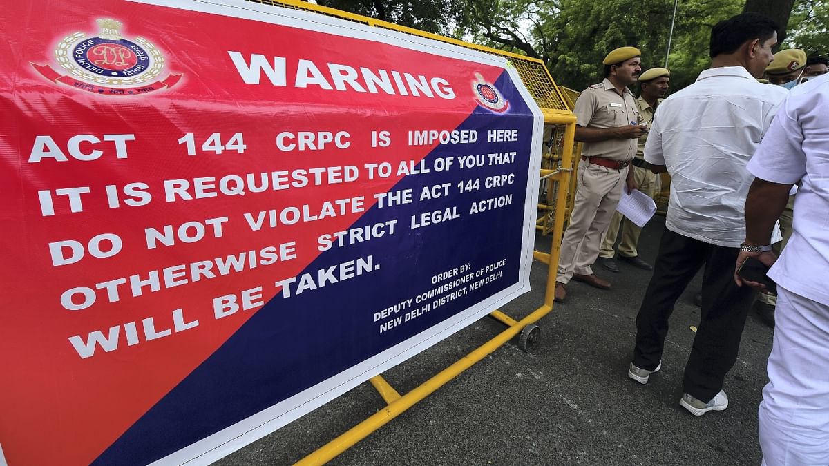 The police have also put up a poster of the order on the barricades outside the AICC office. Credit: PTI Photo