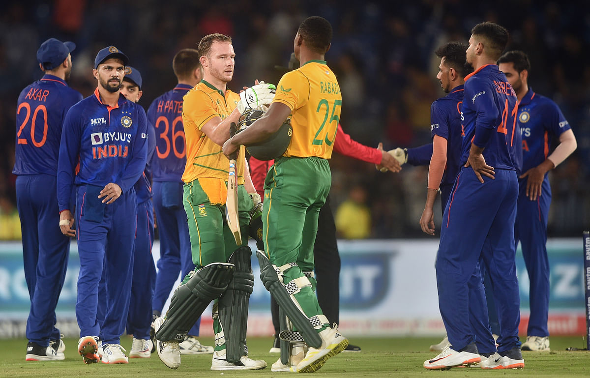 South African batsmen David Miller and Kagiso Rabada greet each other after the end of the 2nd T20 cricket match between India and South Africa, at Barabati stadium in Cuttack. Credit: PTI Photo