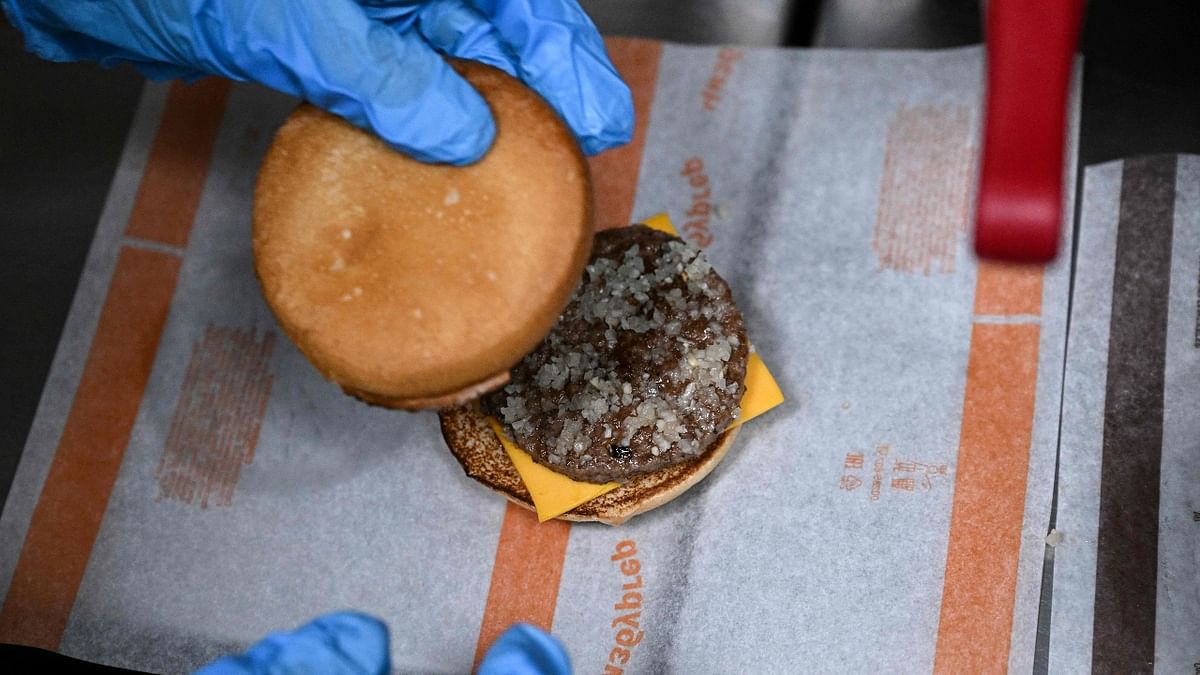 According to a previous deal, the rebranded fast-food network will use new names on the menu and retain all employees under equivalent terms for at least two years. Credit: AFP Photo