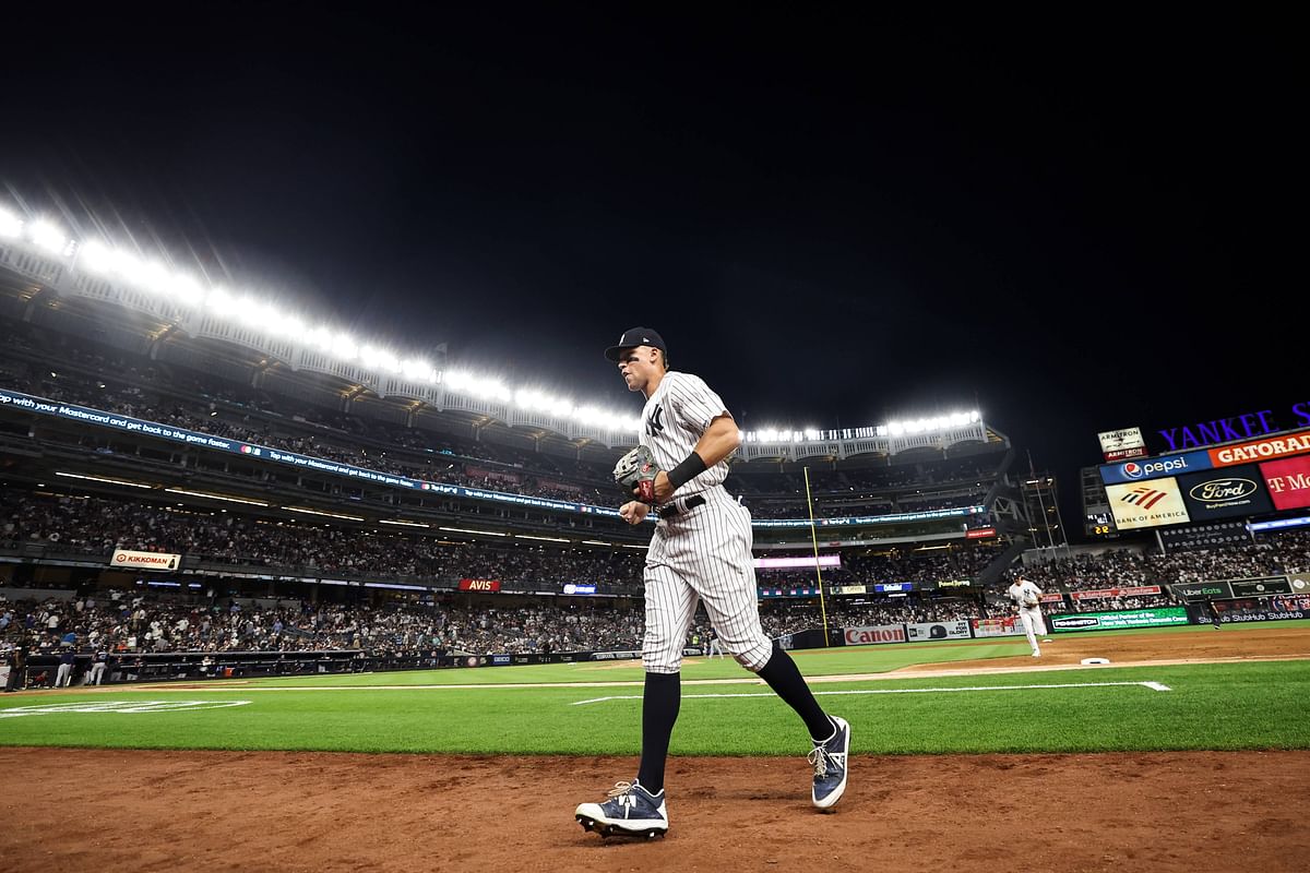Aaron Judge #99 of the New York Yankees jogs off of the field at the end of the sixth inning of the game against the Tampa Bay Rays at Yankee Stadium. Credit: AFP Photo