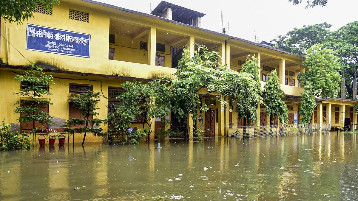 A flooded school after heavy rains at Rukminigaon in Guwahati. Credit: PTI Photo
