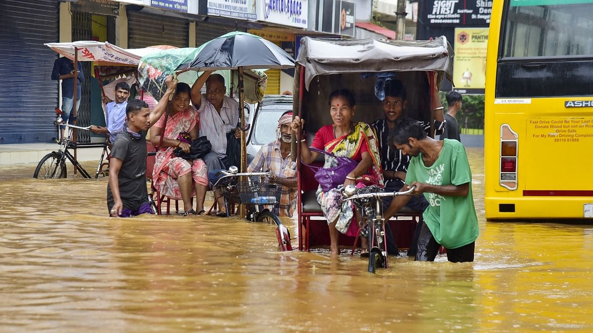After the massive flood and landslides in several state districts in May, Assam was again hit by the incessant rainfall. Credit: PTI Photo