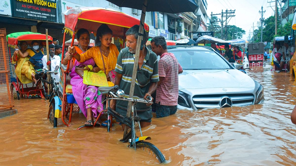 Heavy rain has also flooded roads in several parts of the city – the worst affected among these being Anil Nagar, Nabin Nagar, Rajgarh Link Road, Rukminigaon, Hatigaon and Krishna Nagar. Credit: PTI Photo