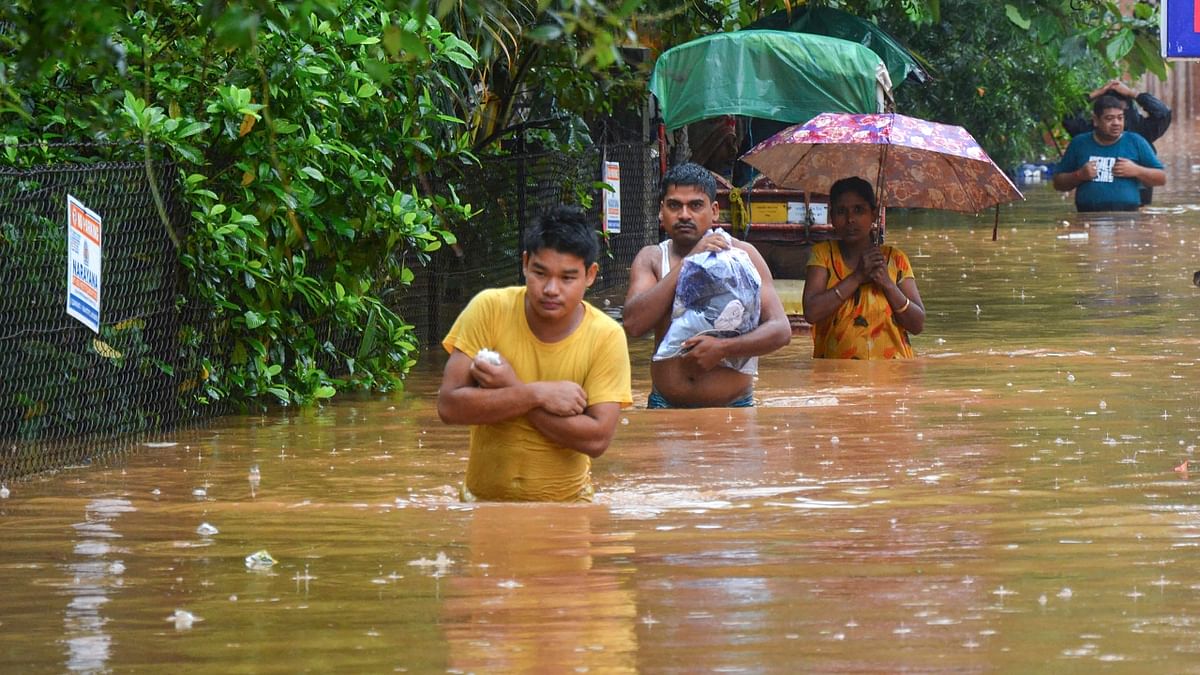 Heavy rains, landslides cripple normal life in Assam; See Pics