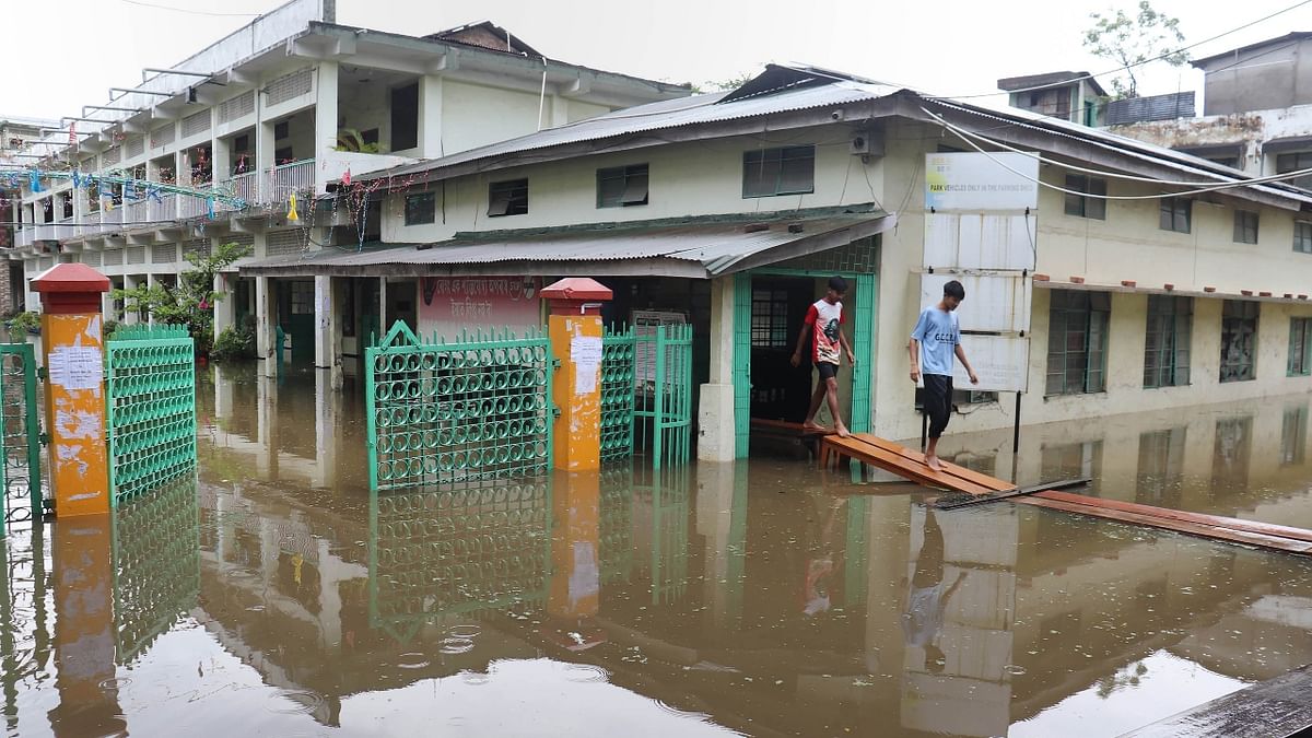 A bulletin issued by the ASDMA said that the flood situation is grim in several parts of the state, with eight districts inundated by the rising water in the river Brahmaputra and its tributaries. Credit: PTI Photo