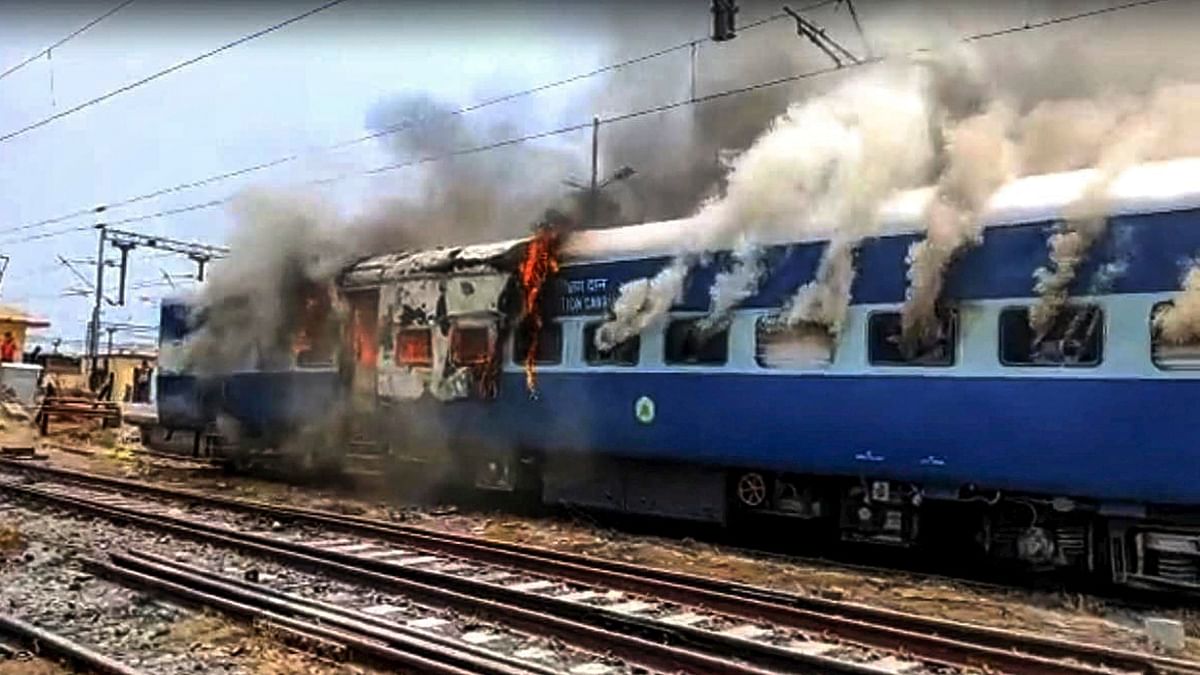 At least three trains were set on fire as protests against the Centre's Agnipath recruitment scheme turned violent. Credit: PTI Photo