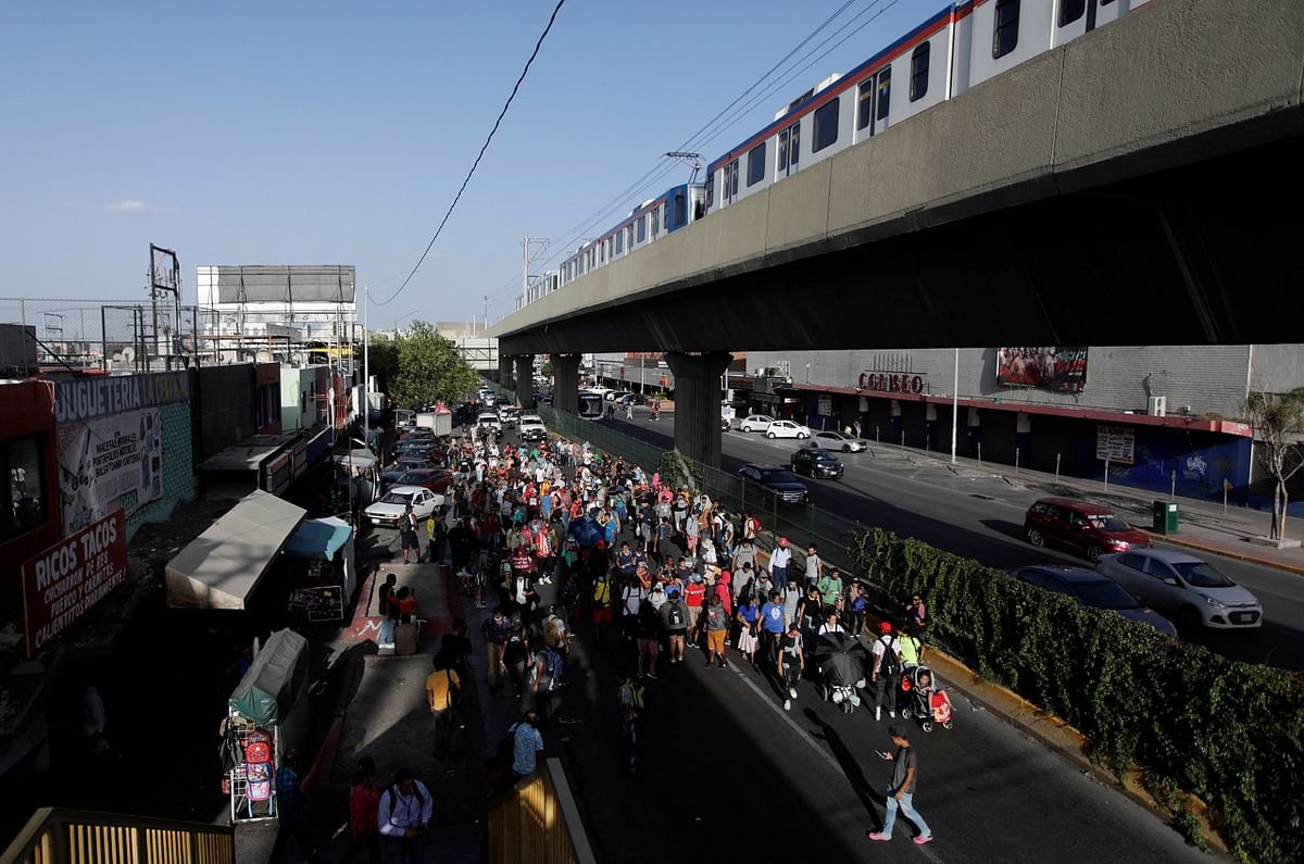 Migrants leave a bus station as they decide to move towards Piedras Negras, in Monterrey. Credit: Reuters Photo
