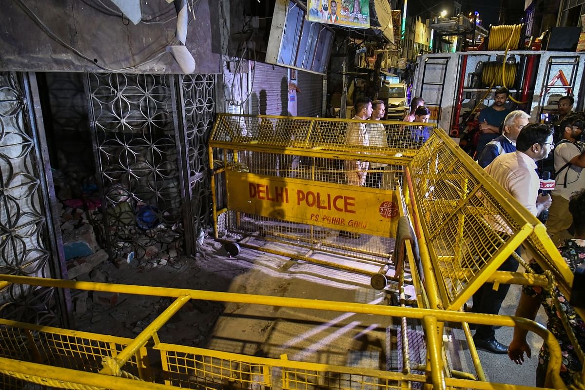 Rescue operation underway after a building collapsed in Paharganj area, in New Delhi. Credit: PTI Photo