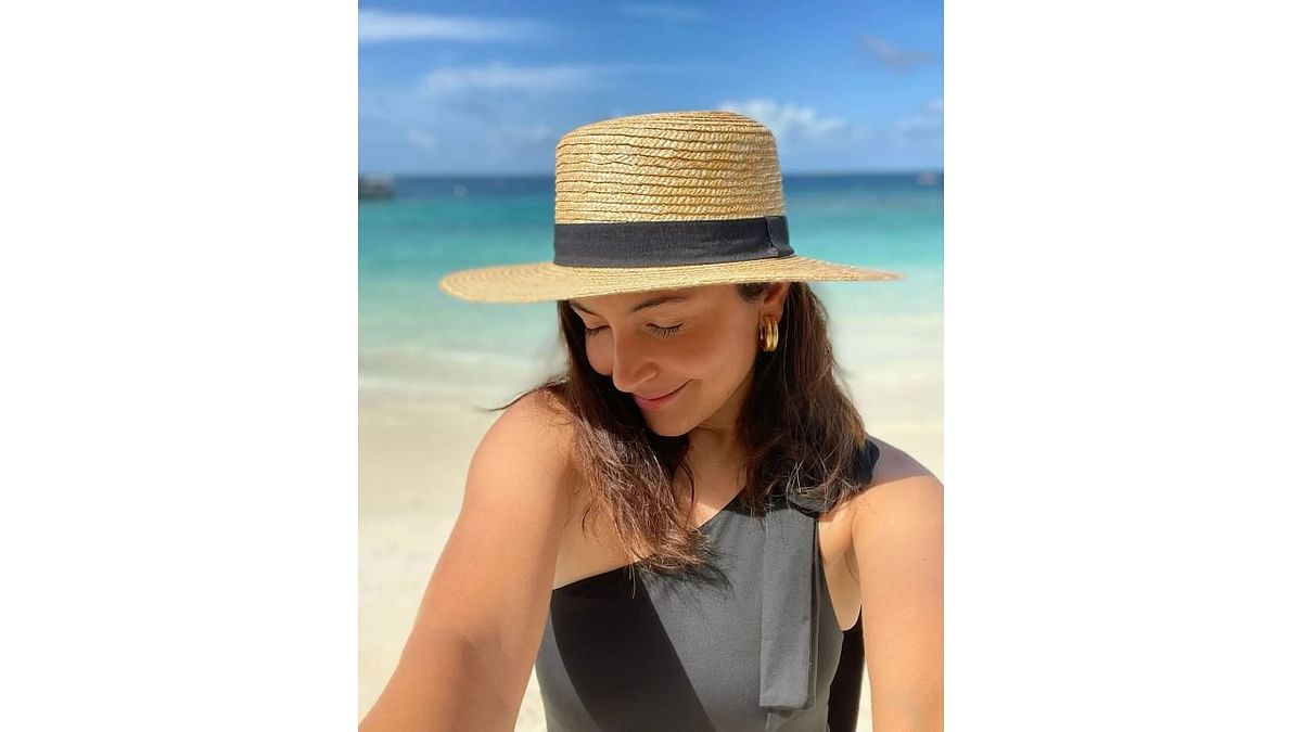 Anushka also shared a couple of sunkissed pictures in a black swimsuit. Credit: Instagram/anushkasharma
