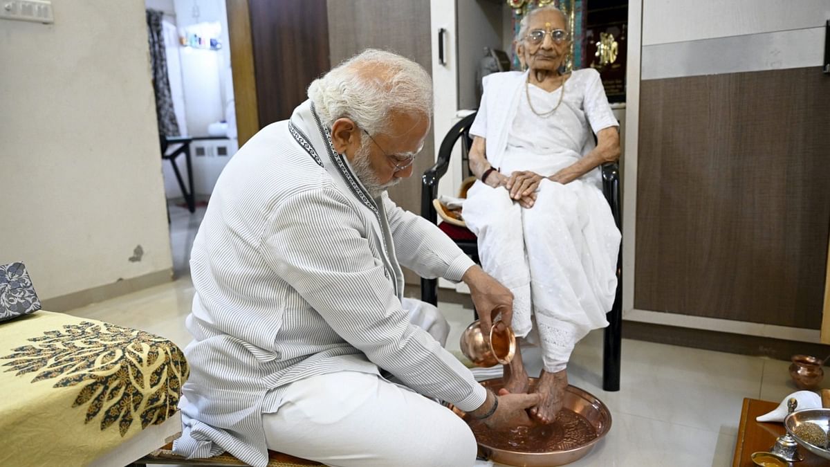 On the special day, he washed her feet and sought her blessings. Credit: Twitter/@narendramodi