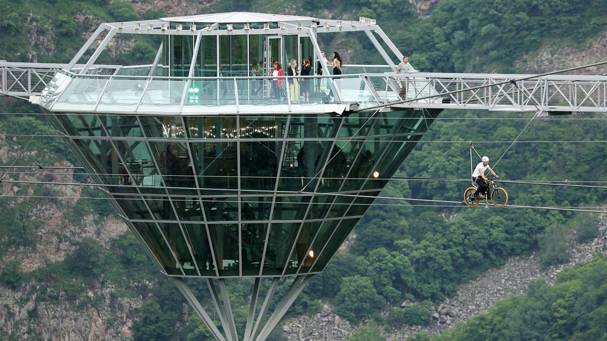 A 240-meter-long glass bridge - with a diamond-shaped cafe has been built outside the city of Tsalka, in Georgia. Credit: Reuters Photo