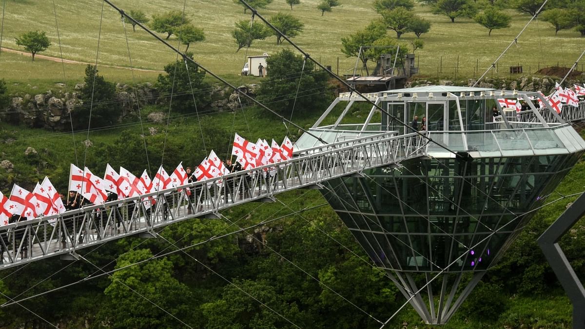 People carrying Georgian flags attended the opening ceremony. Credit: AFP Photo