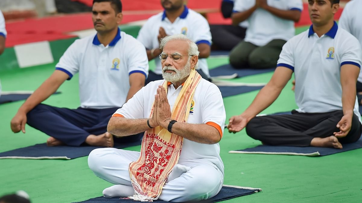Leading the main event of the International Day of Yoga (IDY), Modi said Yoga brings peace to our universe and gave the hope of a healthy life to humanity. Credit: PTI Photo